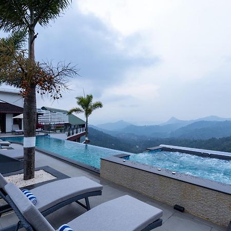 Hotel The Panoramic Getaway à Munnar Extérieur photo The swimming pool at the resort