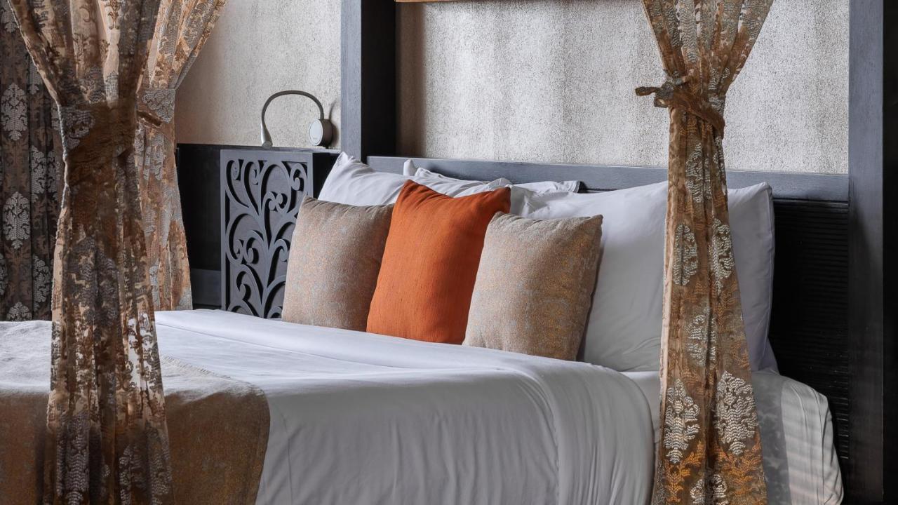 Hotel The Panoramic Getaway à Munnar Extérieur photo A bed with cushions