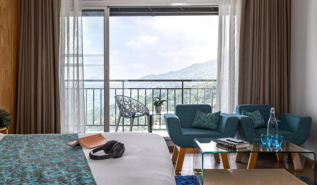 Hotel The Panoramic Getaway à Munnar Extérieur photo A room at the hotel