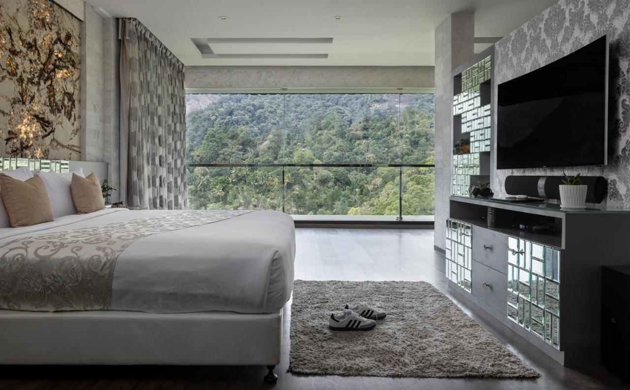 Hotel The Panoramic Getaway à Munnar Extérieur photo A bedroom at the hotel