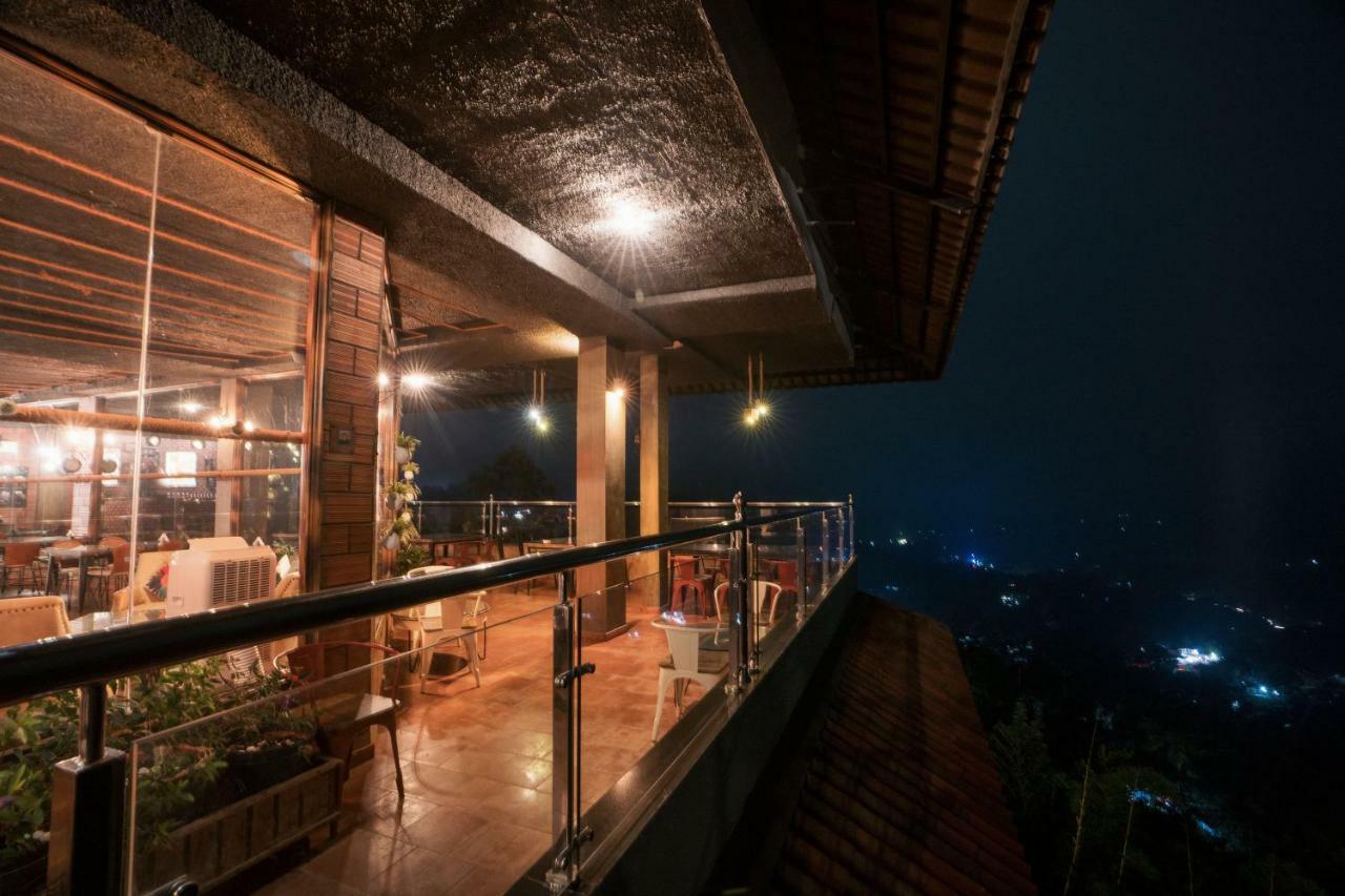 Hotel The Panoramic Getaway à Munnar Extérieur photo The restaurant at the top of the tower